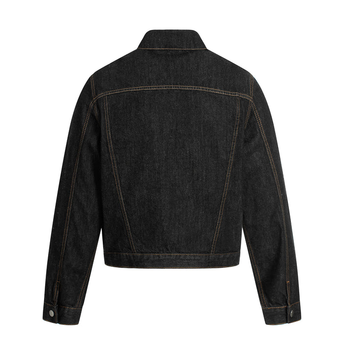 Back view of a black cropped denim jacket with contrast stitching and seam detail