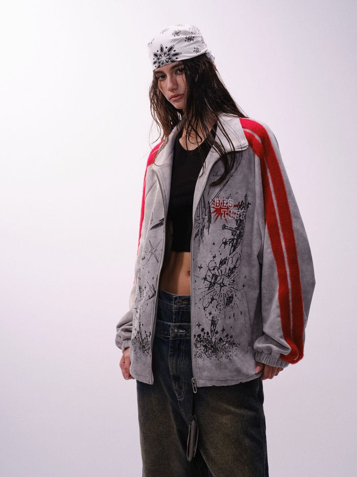 Full-length front view of a gray zip track jacket with red striped sleeves and black graffiti print
