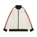 Cream nylon track jacket with red triple stripes, front view, dark brown collar and hem