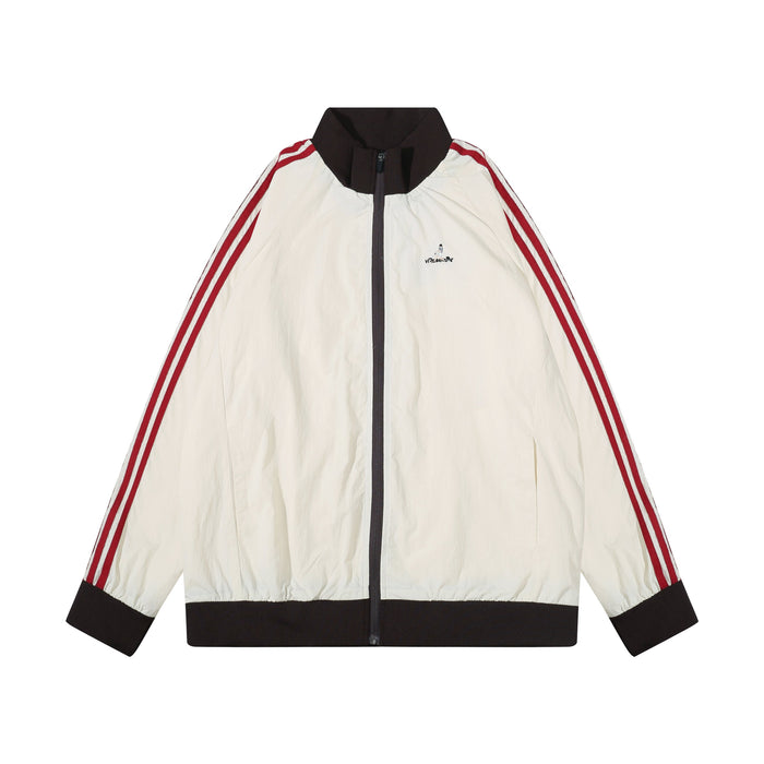 Cream nylon track jacket with red triple stripes, front view, dark brown collar and hem