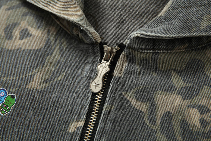 Close-up of metal zipper pull on rose camo zip-up hoodie