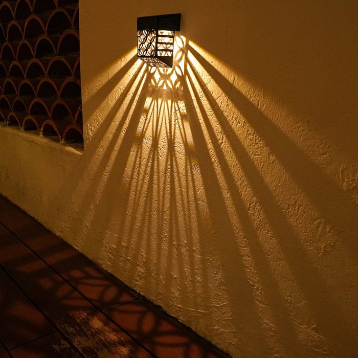 Solar Hollow Outdoor Wall Sconce Fence Light Shadow Pattern LED Dusk to Dawn | NordaLight