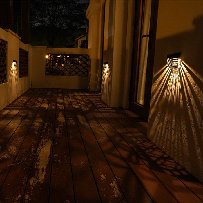 Solar Hollow Outdoor Wall Sconce Fence Light Shadow Pattern LED Dusk to Dawn | NordaLight