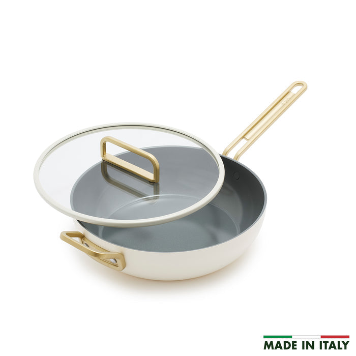 White ceramic 4.5-quart nonstick pan with handles, Stanley Tucci™ brand, shown on a plain background.