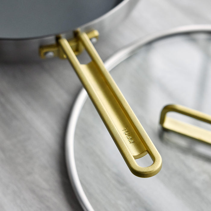 Stainless steel pan handle with Hark engraved, attached to a ceramic nonstick 4.5-quart pan.