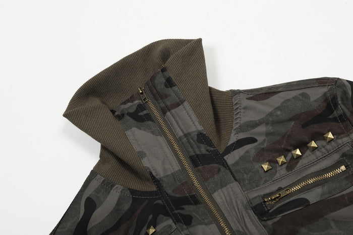 Close-up of camo bomber collar, zipper and studded chest pocket