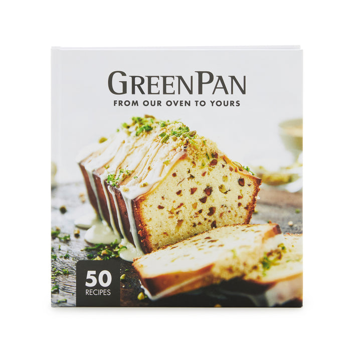 Cookbook cover with a sliced loaf cake topped with white icing and chopped nuts.