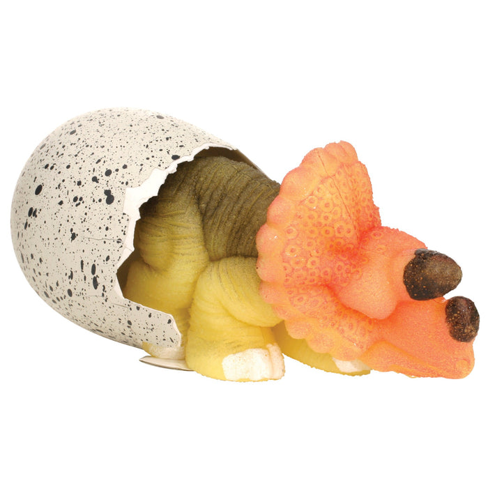 The Toysmith Ginormous Hatchin' Grow Dino Egg reveals a baby triceratops with a bright orange frill emerging from a speckled egg—a fun, growing dinosaur toy by Toysmith for any kids activity.