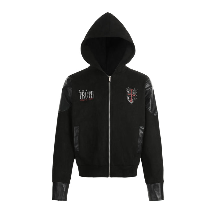 Front view of black hooded jacket with black faux leather sleeves and embroidered chest graphics