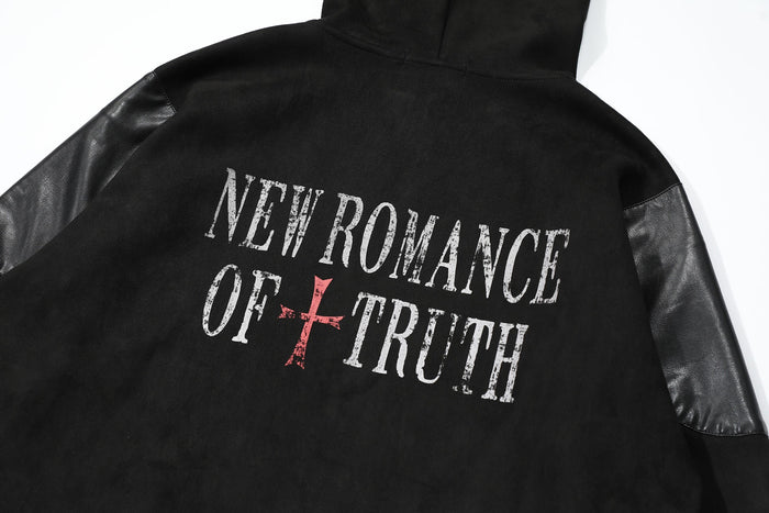 Close-up of back graphic on black hooded jacket reading New Romance of Truth