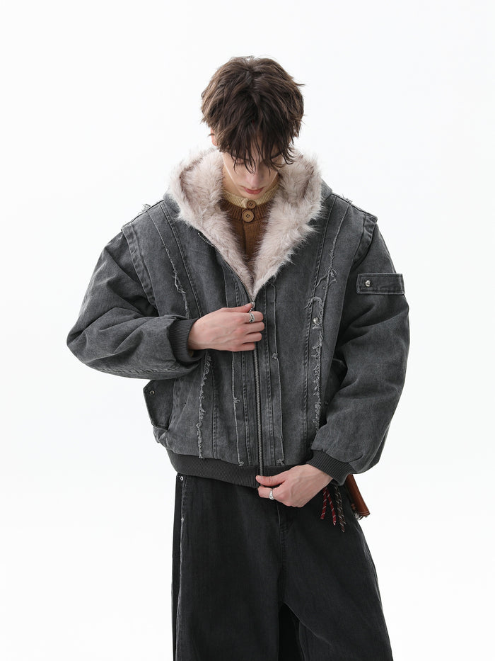 Black shearling-lined denim bomber jacket worn open on a model, front view