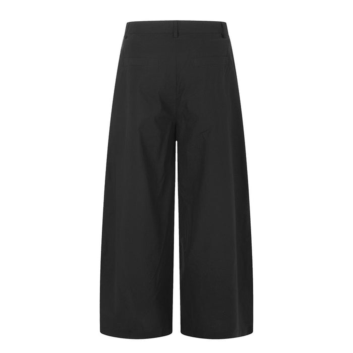 Black wide-leg pleated trousers shown from the back