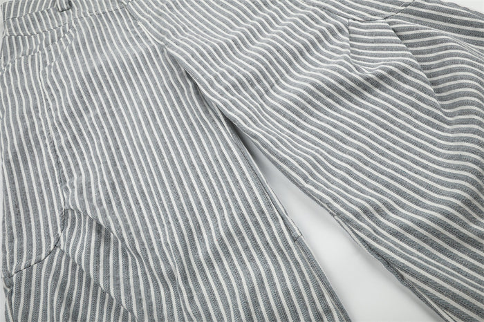 Close-up of the seat and upper leg on gray striped wide-leg pants
