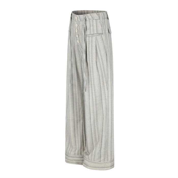 Side view of gray striped wide-leg trousers with button fly and cuffed hems