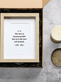 Sympathy gift box with a photo frame, bereavement card, vanilla candle, and ceramic tray, for showing support during loss.