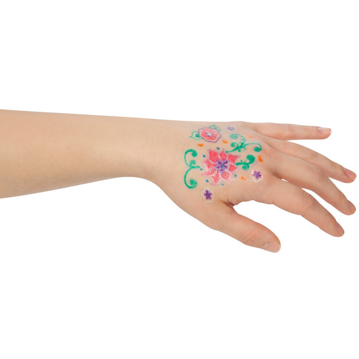A hand decorated with green, pink, purple, and red floral and swirl designs from wrist to knuckles using YAY! Ink-A-Do Tattoo Pens by YAY!—temporary body art for creative expression.